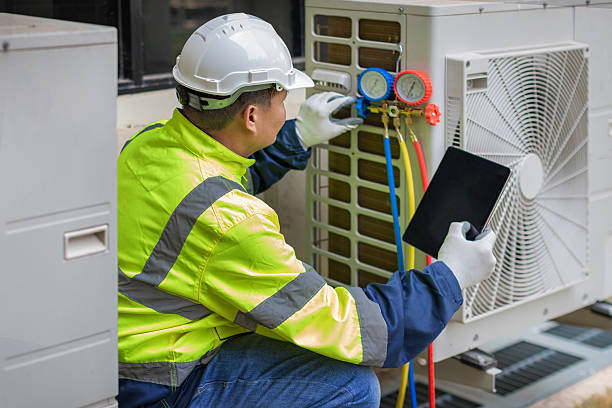 Professional Hvac technician working in Loxley, AL